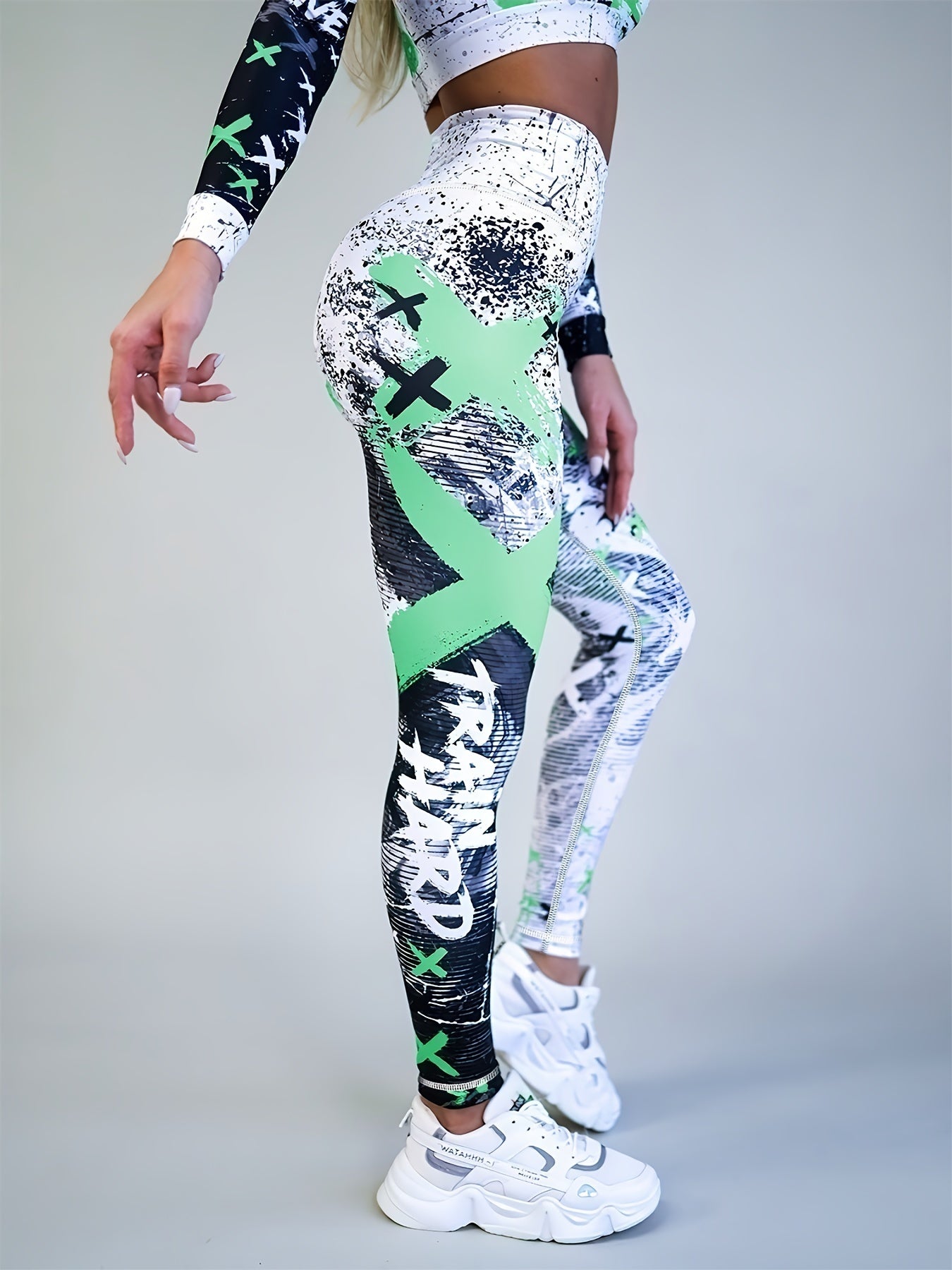Yoga-Sport-Leggings mit hoher Taille, Farbblock-Graffiti-Design, Po-Lifting
